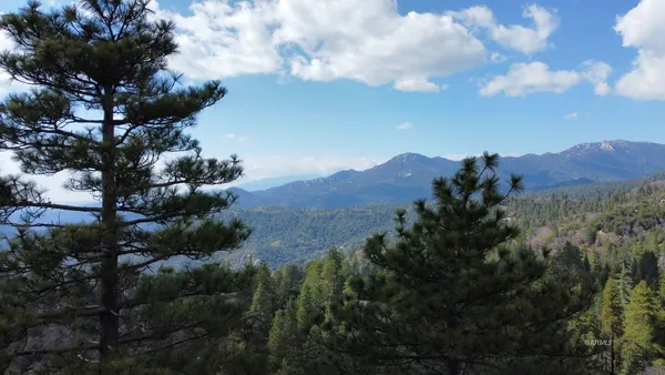 a view of a house with a street