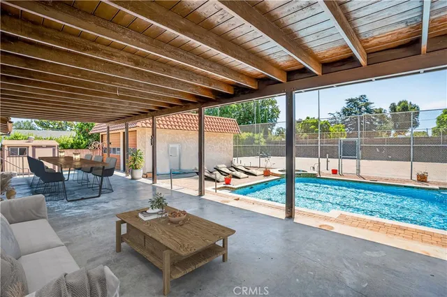 a living room with furniture and a outdoor space