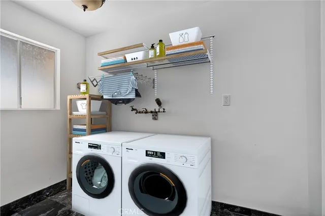 an aerial view of residential houses and city street