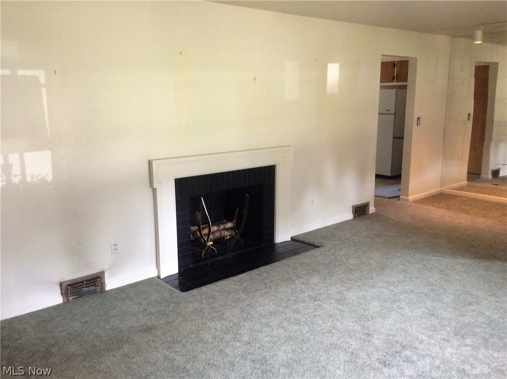 802 Ewing Road Youngstown, OH 44512 - Photo 7 of 23 LIVING ROOM WITH FIREPLACE