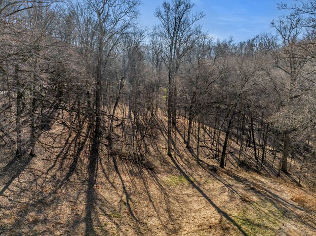 a view of a yard covered with snow