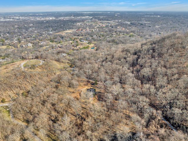 a view of a dry yard with wooden floor