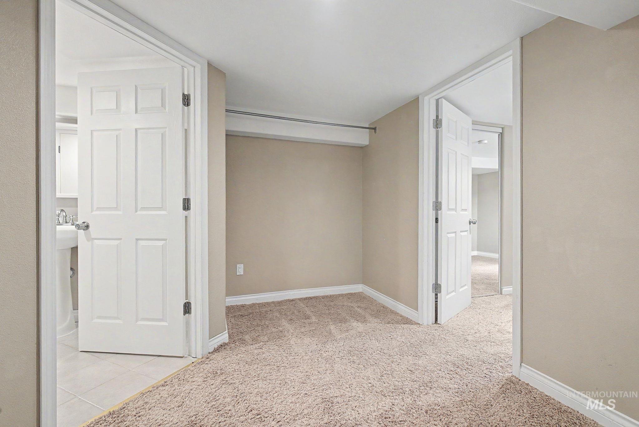 3314 6th Street Lewiston, ID 83501 - Photo 37 of 50 Room featuring neutral-toned walls, plush carpeting, and white baseboards