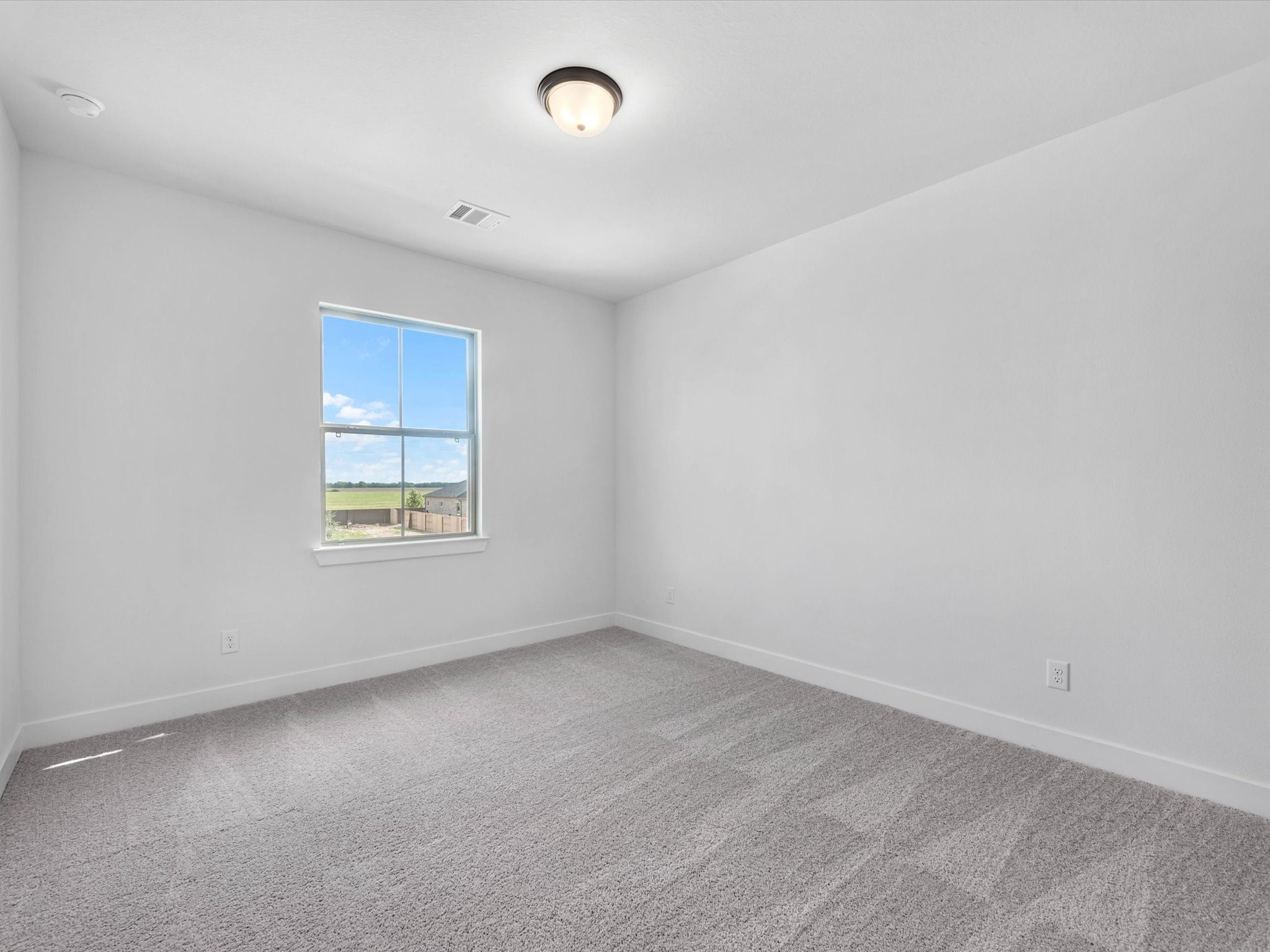 4911 Benton Wds Trail Rosenberg, TX 77471 - Photo 19 of 29 an empty room with a window