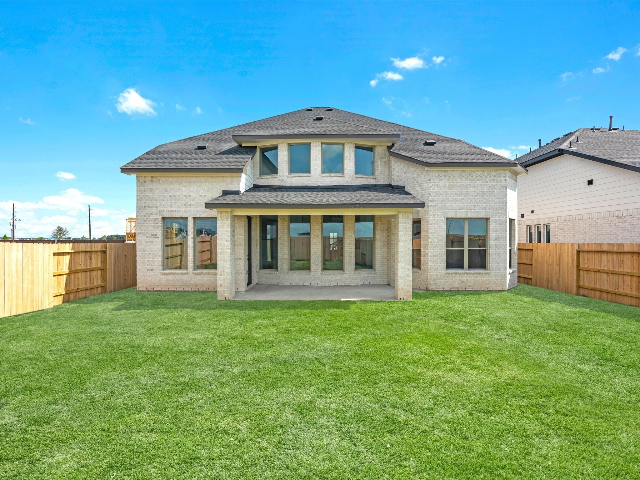 4911 Benton Wds Trail Rosenberg, TX 77471 - Photo 21 of 29 a big house with a big yard and large trees