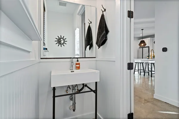 a view of kitchen with furniture and wooden floor