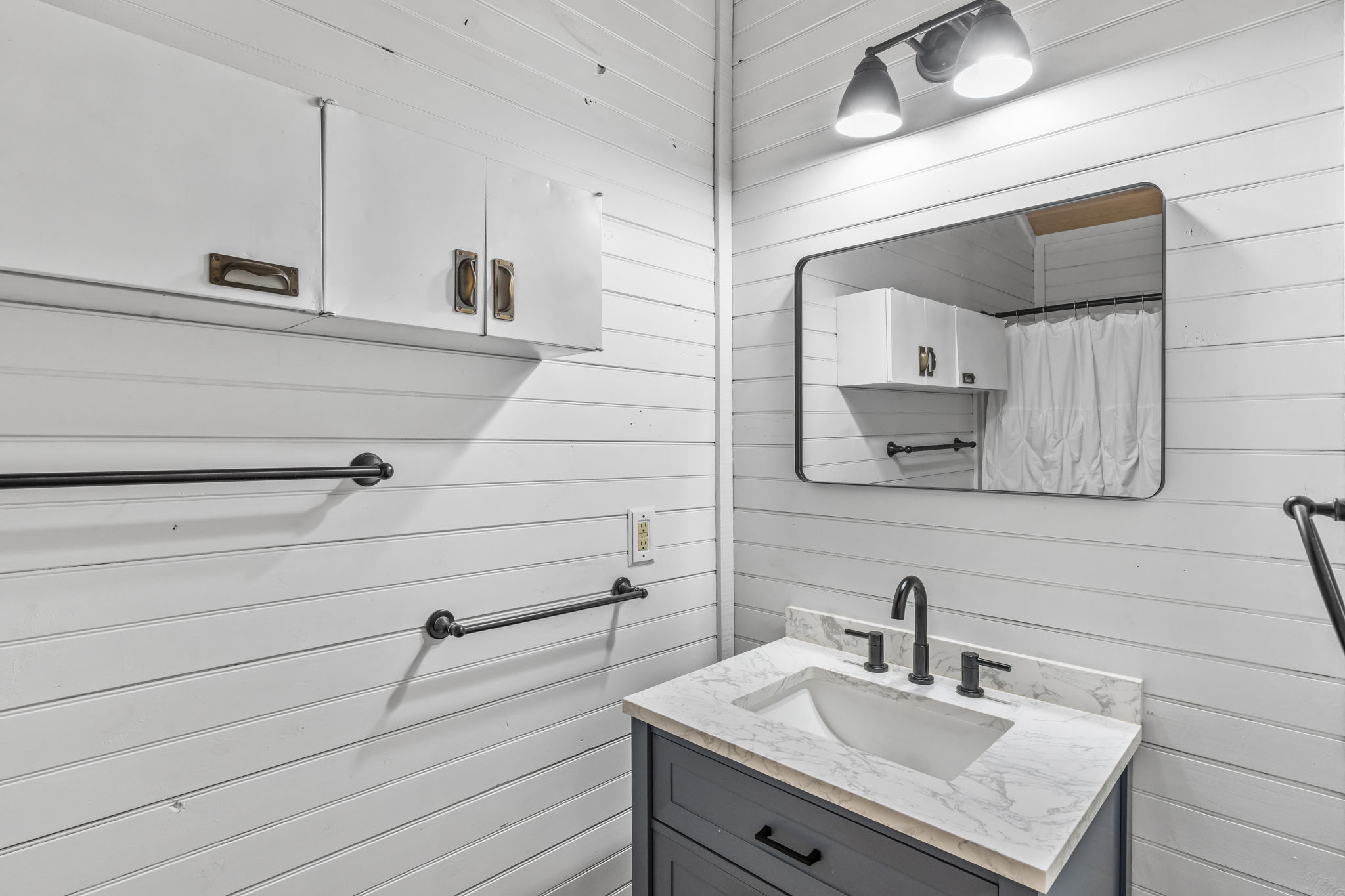225 Ischar Lane Mason, TX 76856 - Photo 23 of 37 a bathroom with a sink and a mirror