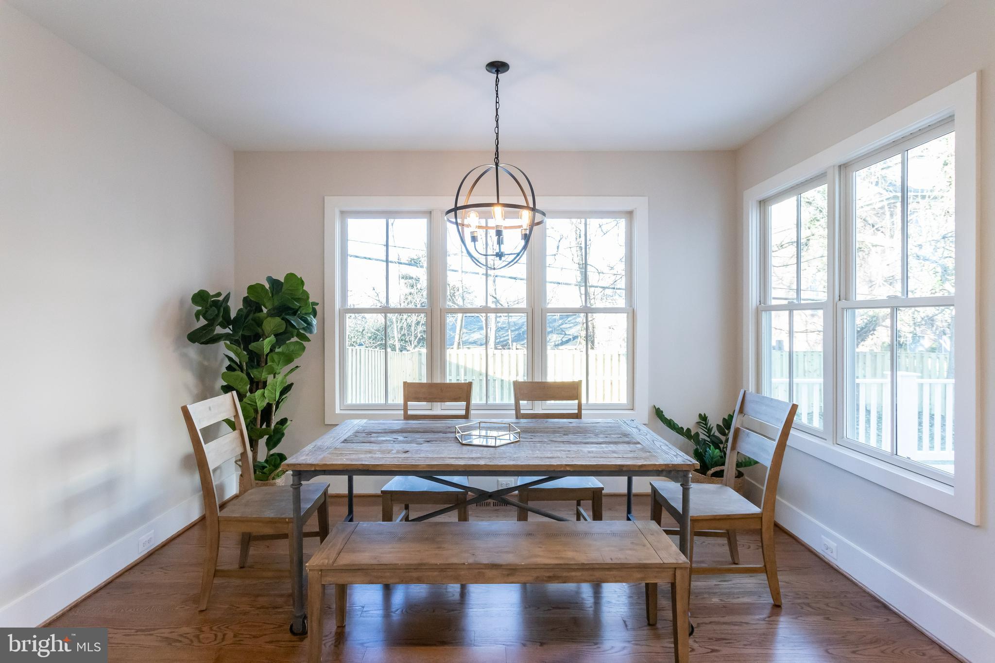 734 North Wakefield Street Arlington, VA 22203 - Photo 11 of 26 a view of a dining room with furniture window and wooden floor