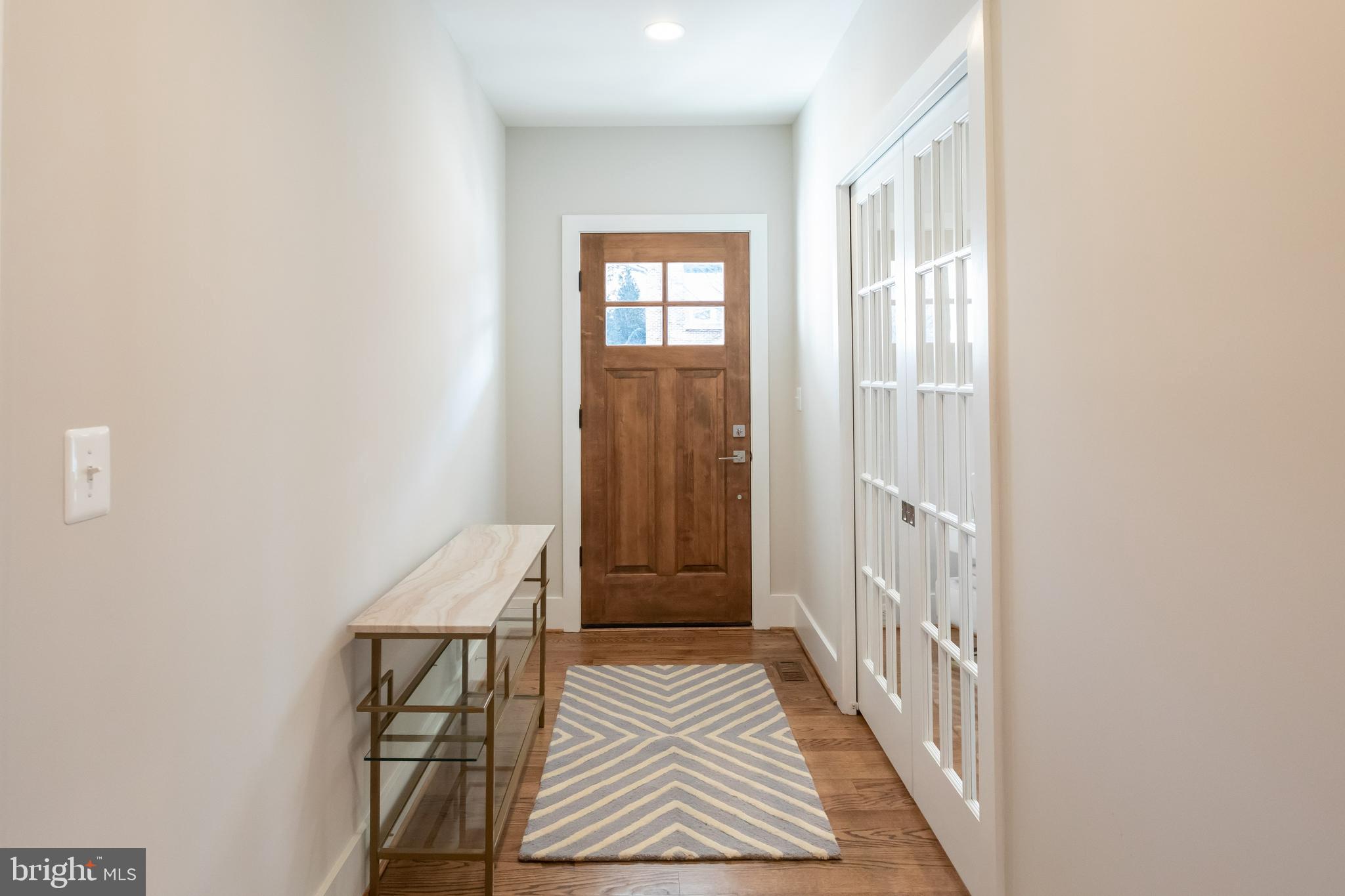 734 North Wakefield Street Arlington, VA 22203 - Photo 4 of 26 a view of a hallway with windows