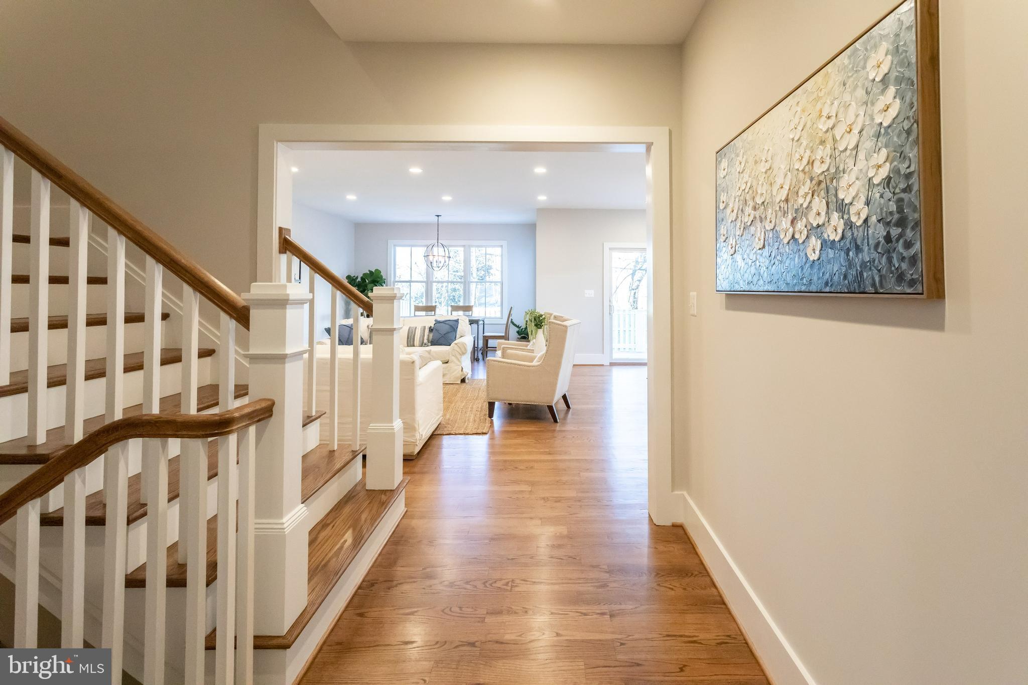 734 North Wakefield Street Arlington, VA 22203 - Photo 8 of 26 a view of a hallway with wooden floor and staircase