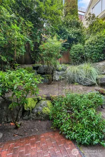 a backyard of a house with lots of green space