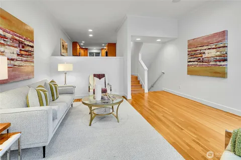 a living room with furniture and a table