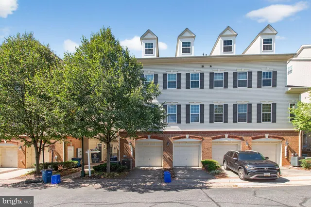 a front view of a building with street view