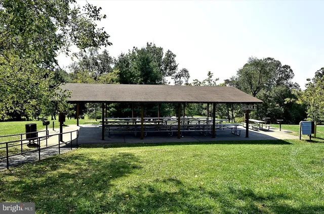 a sign broad in front of the road