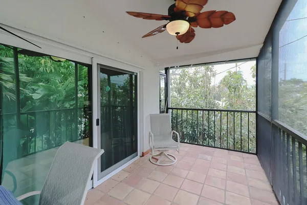 a bedroom with a bed and a desk