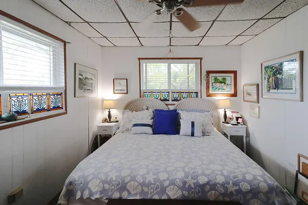 a view of a livingroom with furniture and workspace