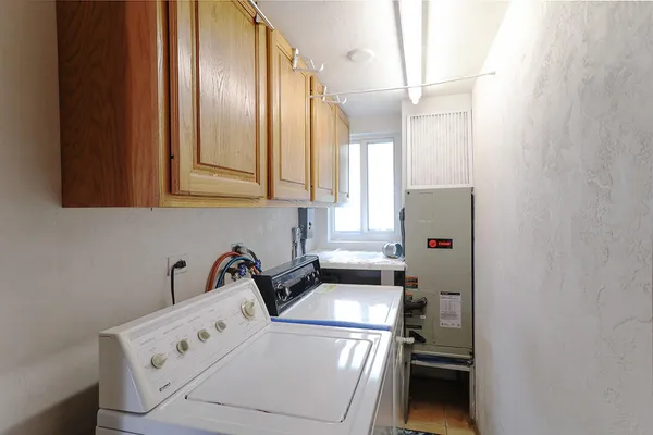 a room with furniture and wooden floor