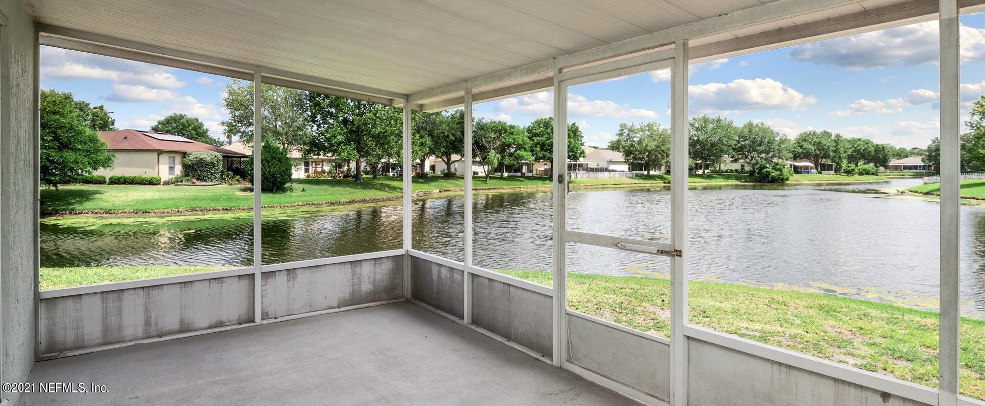 12584 Reeding Ridge Drive North Jacksonville, FL 32225 - Photo 9 of 28 Covered Screened Porch