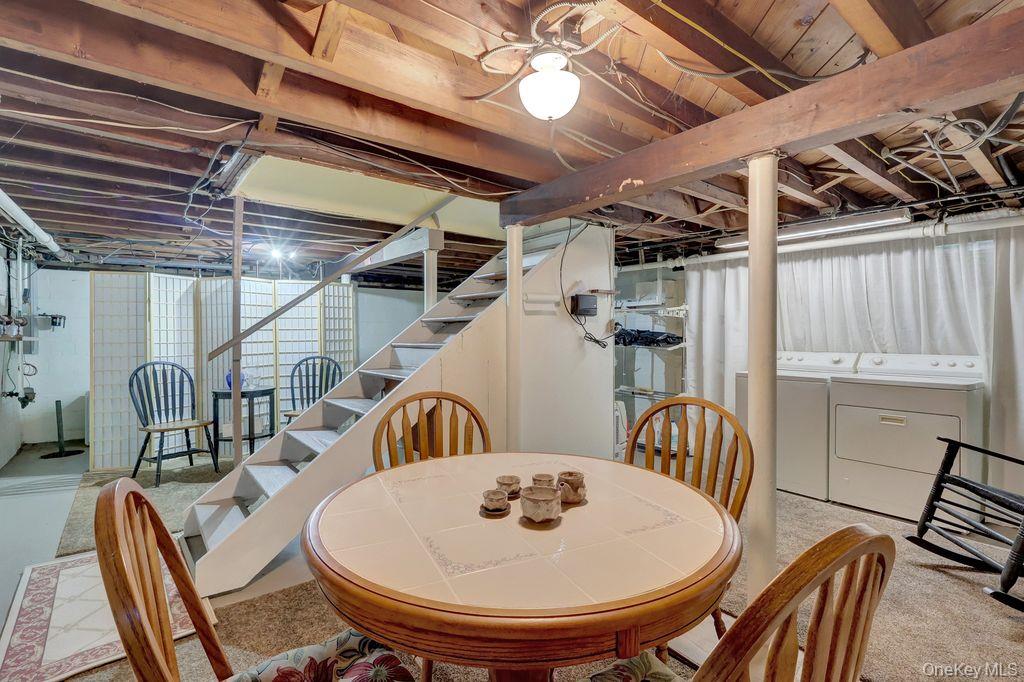 5 Newell Road Merrick, NY 11566 - Photo 14 of 19 a view of a dining room with furniture