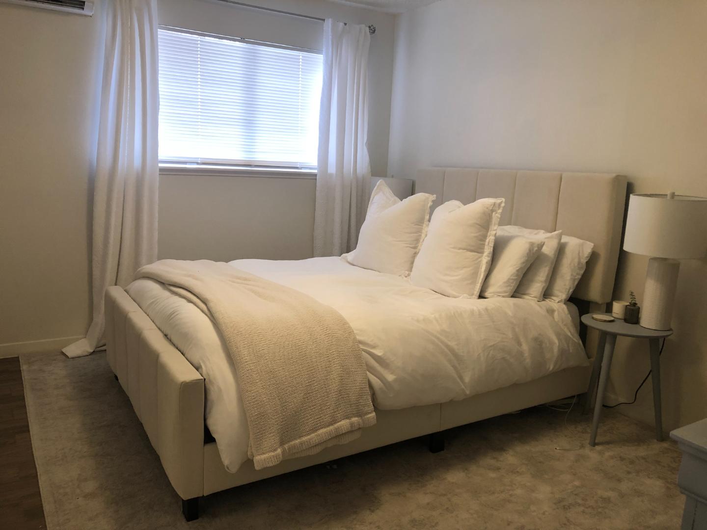 1915 Fairlawn Lane, Unit 2 Austin, TX 78704 - Photo 8 of 12 Bedroom featuring carpet floors and a wall mounted AC
