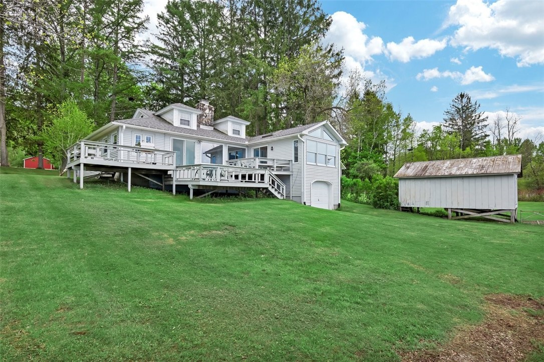 115 Log Cabin Road Otsego, NY 13439 - Photo 6 of 49 Backyard view with boat house.