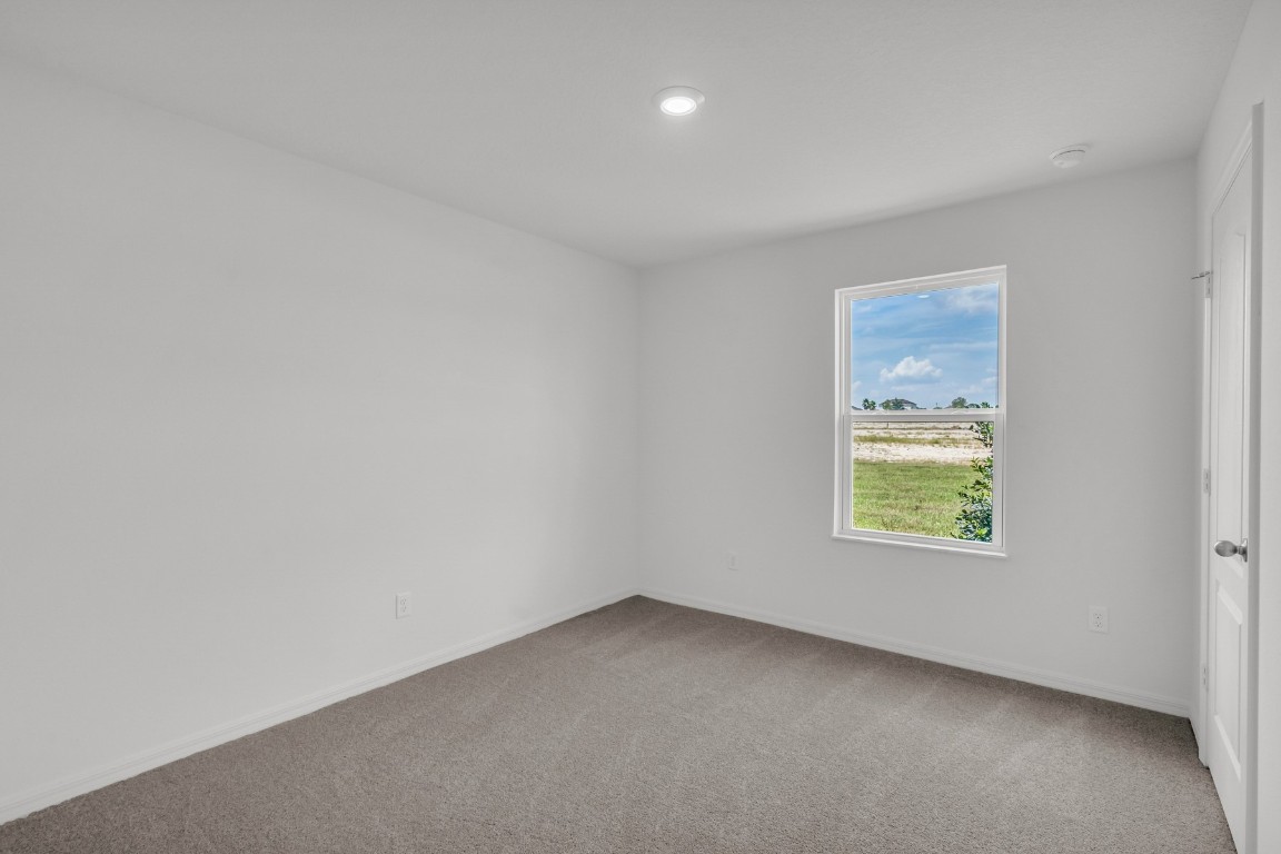 37255 Whisper Way Hilliard, FL 32046 - Photo 17 of 20 an empty room with a window