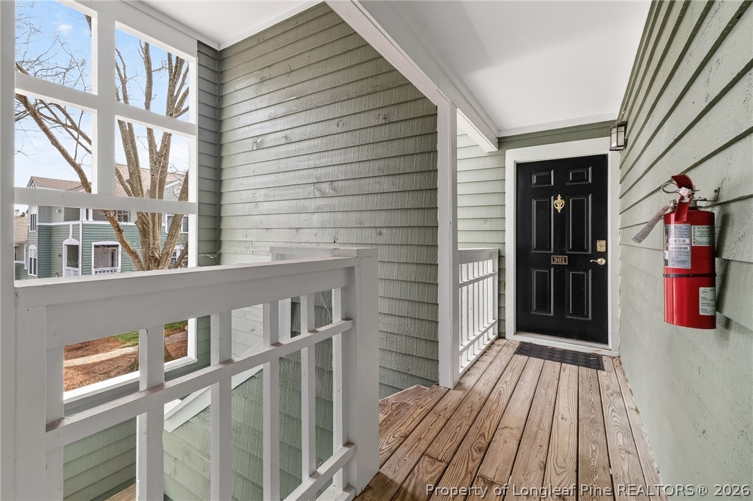 1221 Westview Lane, Unit 301 Raleigh, NC 27605 - Photo 3 of 32 a view of wooden balcony