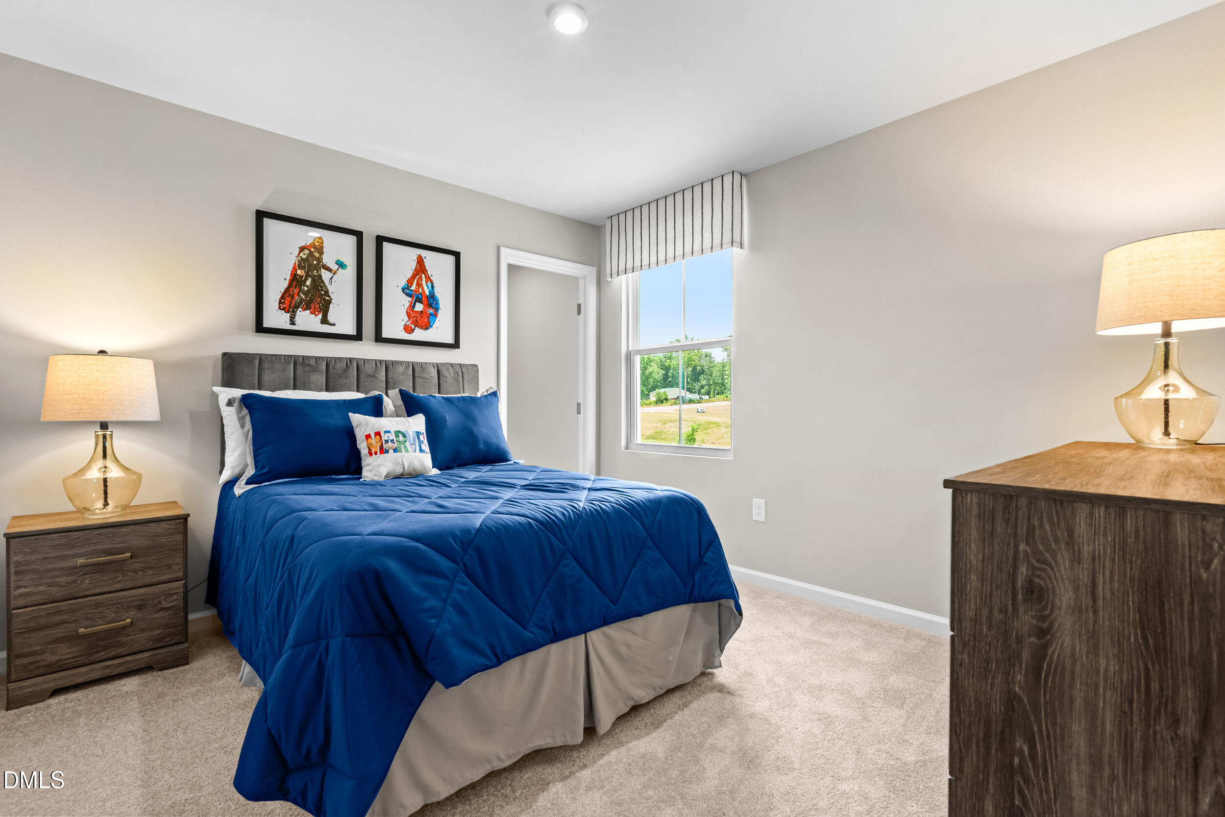 197 Brook Bawn Road Wendell, NC 27591 - Photo 23 of 33 a bedroom with a bed and a lamp on dresser