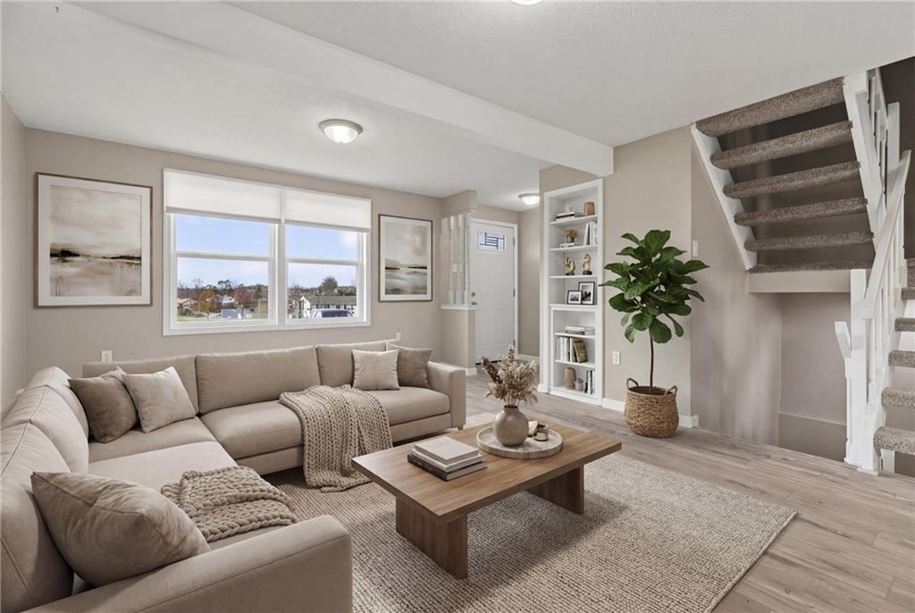 518 Hemlock Court Coraopolis, PA 15108 - Photo 6 of 34 a living room with furniture and a large window