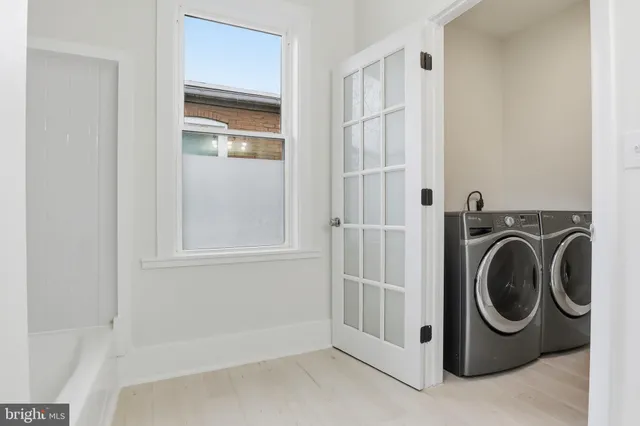 a utility room with dryer and washer