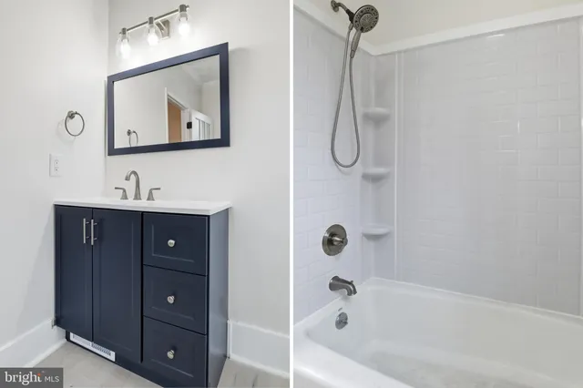 a bathroom with a sink vanity tub and shower