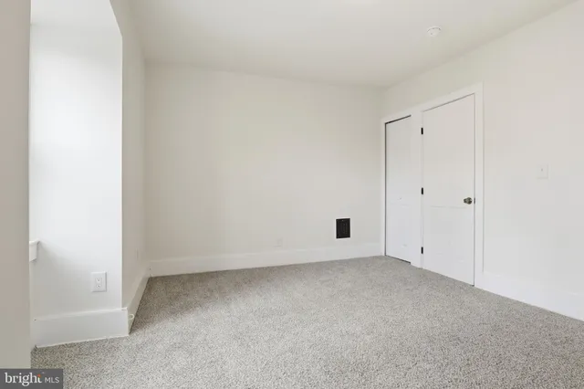 an empty room with an entryway