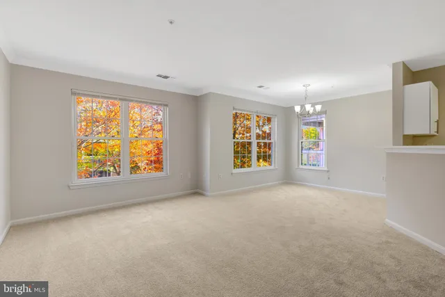 an empty room with windows