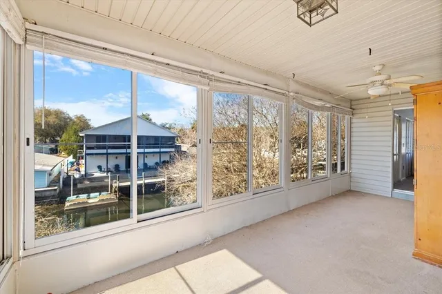 a view of a room with a large window