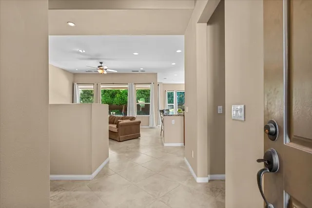 a view of a livingroom with furniture and windows