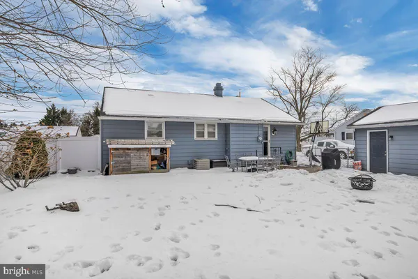 a view of a house with snow in snow