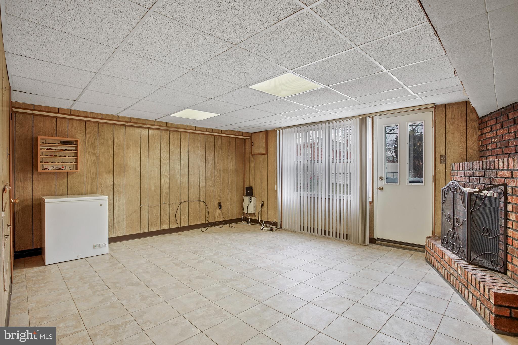 1143 Morefield Road Philadelphia, PA 19115 - Photo 13 of 15 Finished Basement (access to fenced in backyard)