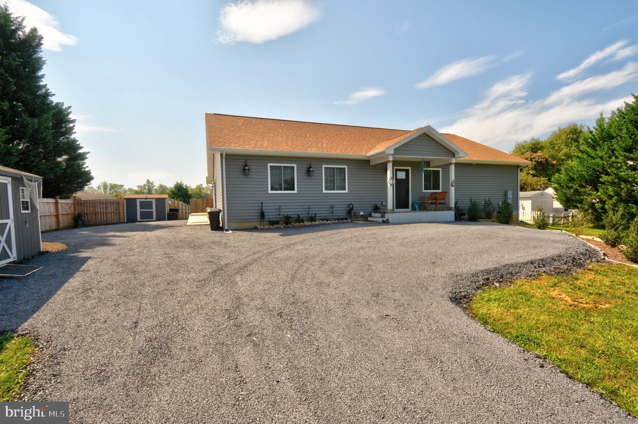Front view of home with driveway.