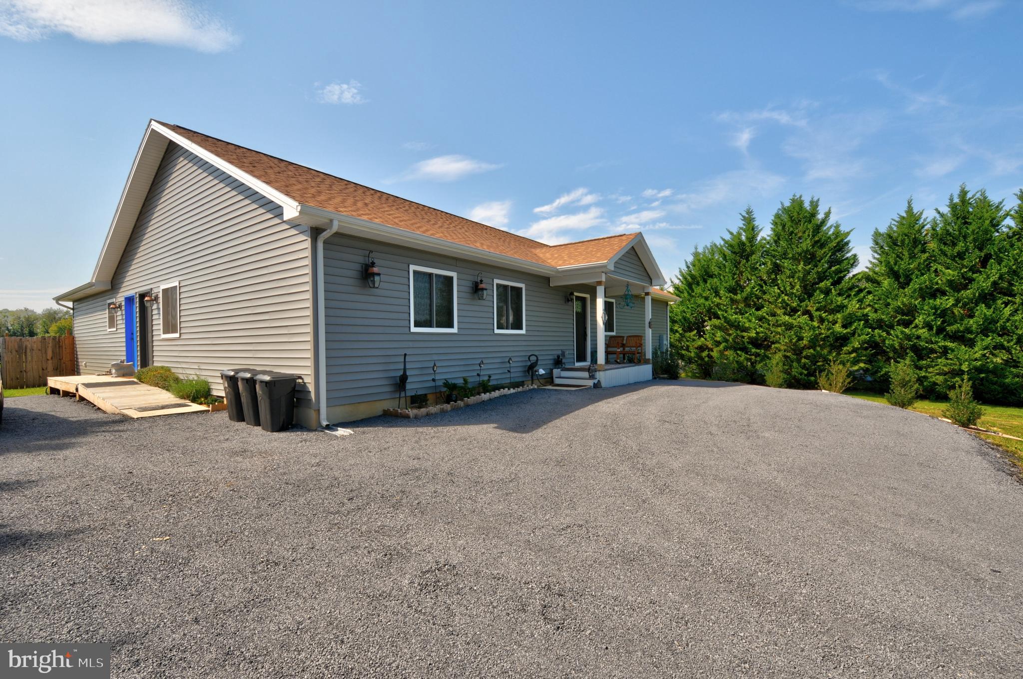 Front view of home with driveway.