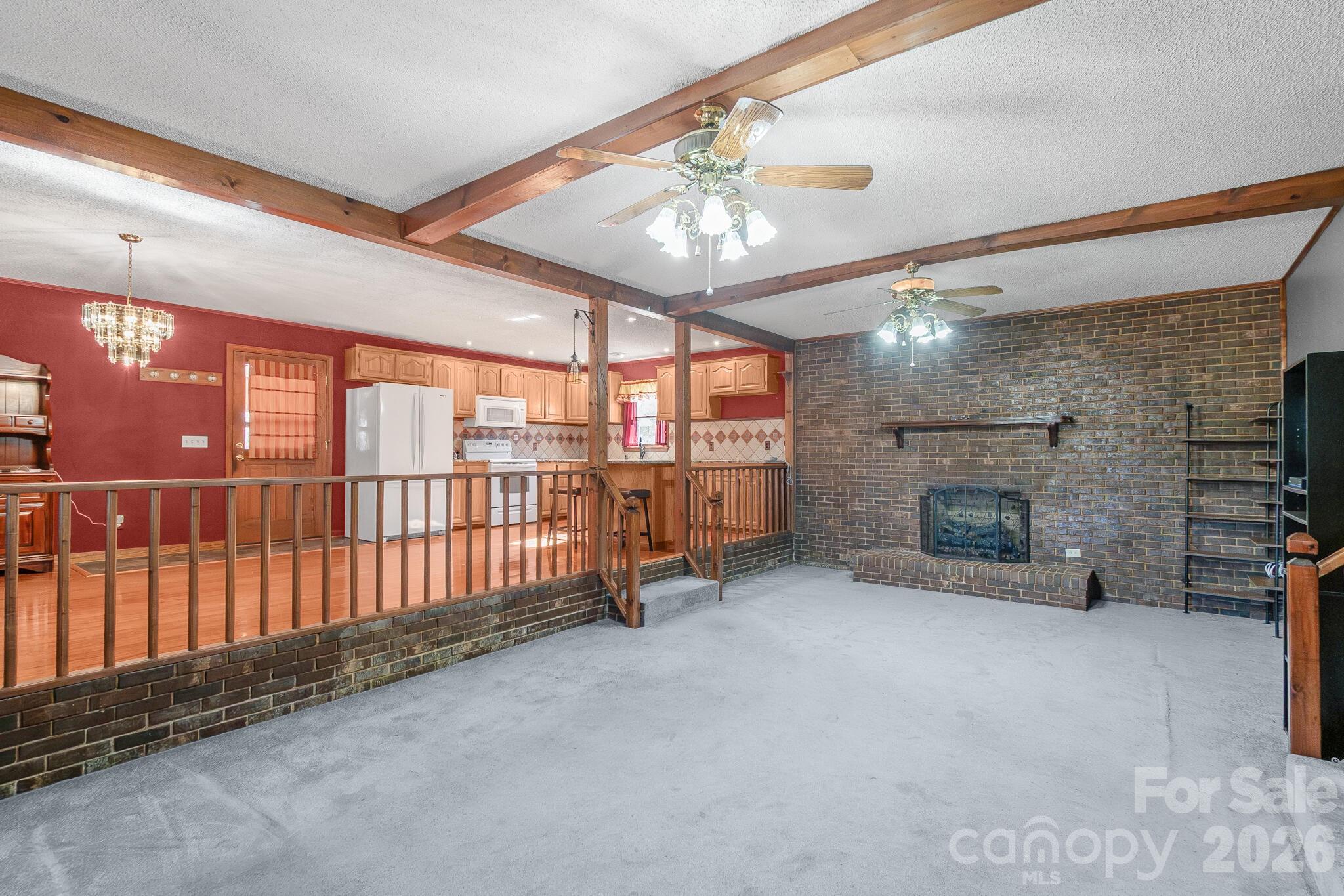 1295 Cattle Ridge Road Cheraw, SC 29520 - Photo 7 of 21 a view of a livingroom with a fireplace