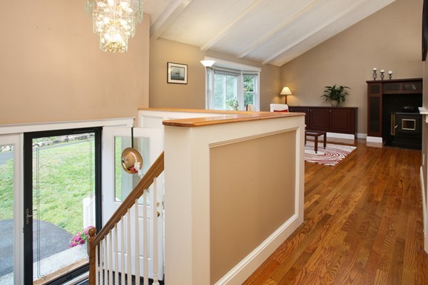 152 Littlefield Road Boxborough, MA 01719 - Photo 2 of 10 a view of living room kitchen with furniture and wooden floor
