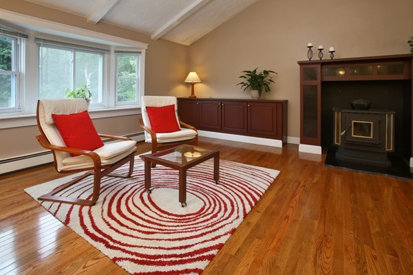 152 Littlefield Road Boxborough, MA 01719 - Photo 4 of 10 a living room with furniture and a fireplace