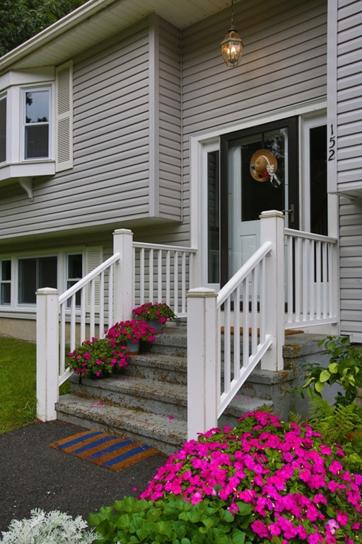 152 Littlefield Road Boxborough, MA 01719 - Photo 9 of 10 a front view of house and yard