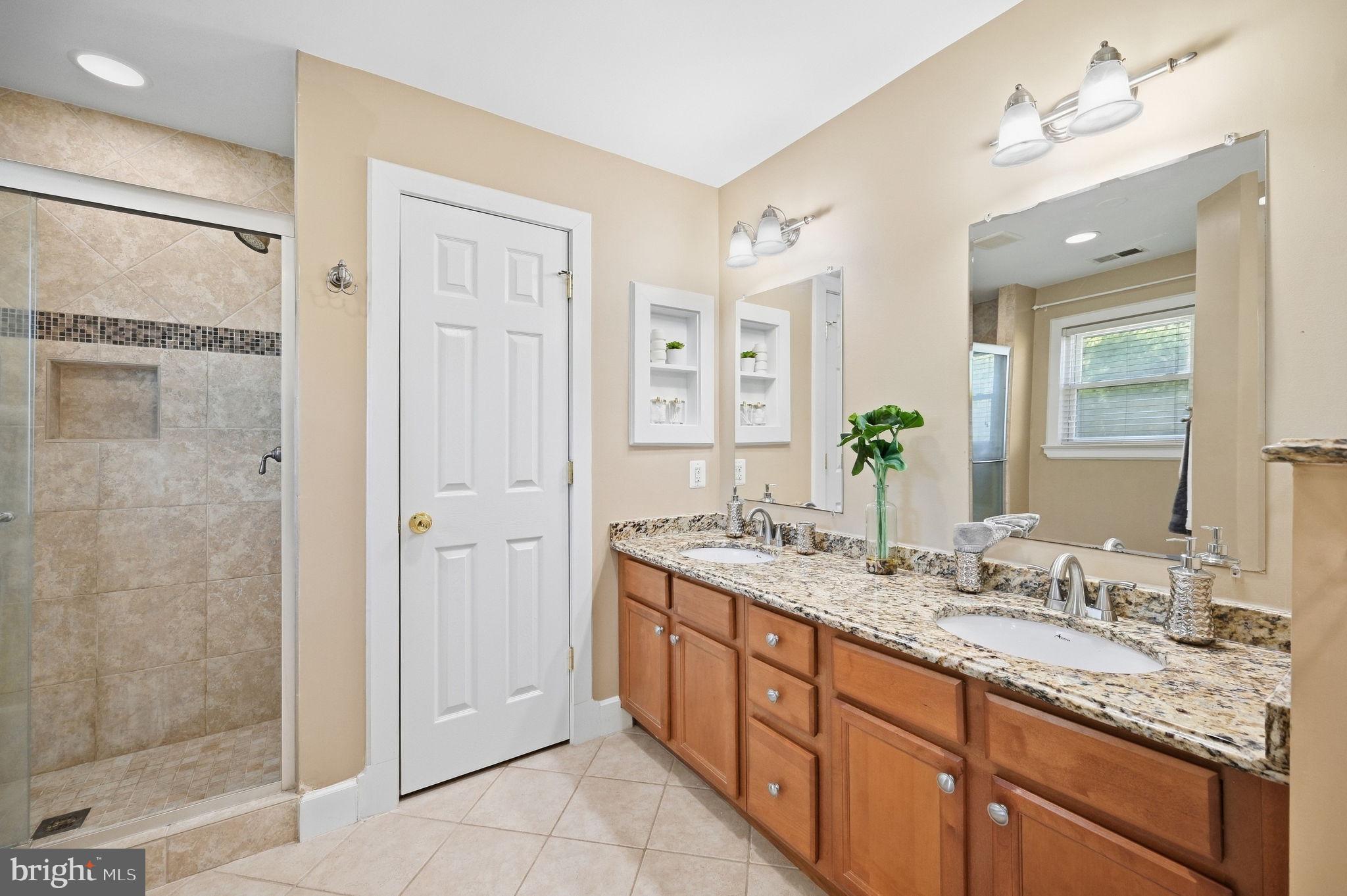2819 Rifle Ridge Road Oakton, VA 22124 - Photo 41 of 76 Primary bath w/ two walk-in closets, double vanity