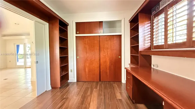 wooden floor and windows in a room