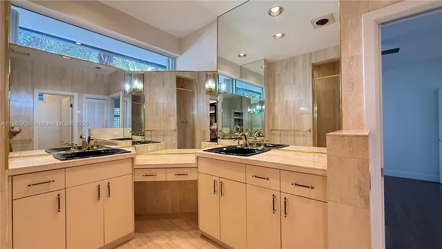 a kitchen with a sink stove and refrigerator