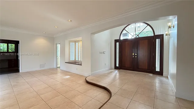a view of swimming pool with seating space