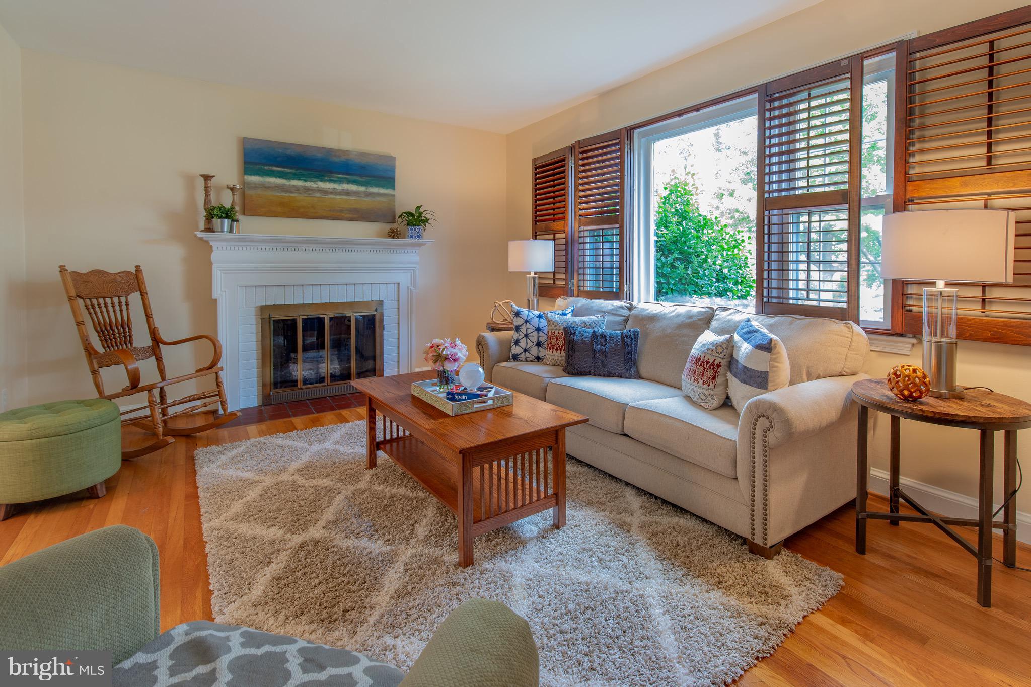 9522 Saybrook Avenue Silver Spring, MD 20901 - Photo 1 of 29 a living room with furniture and a fireplace