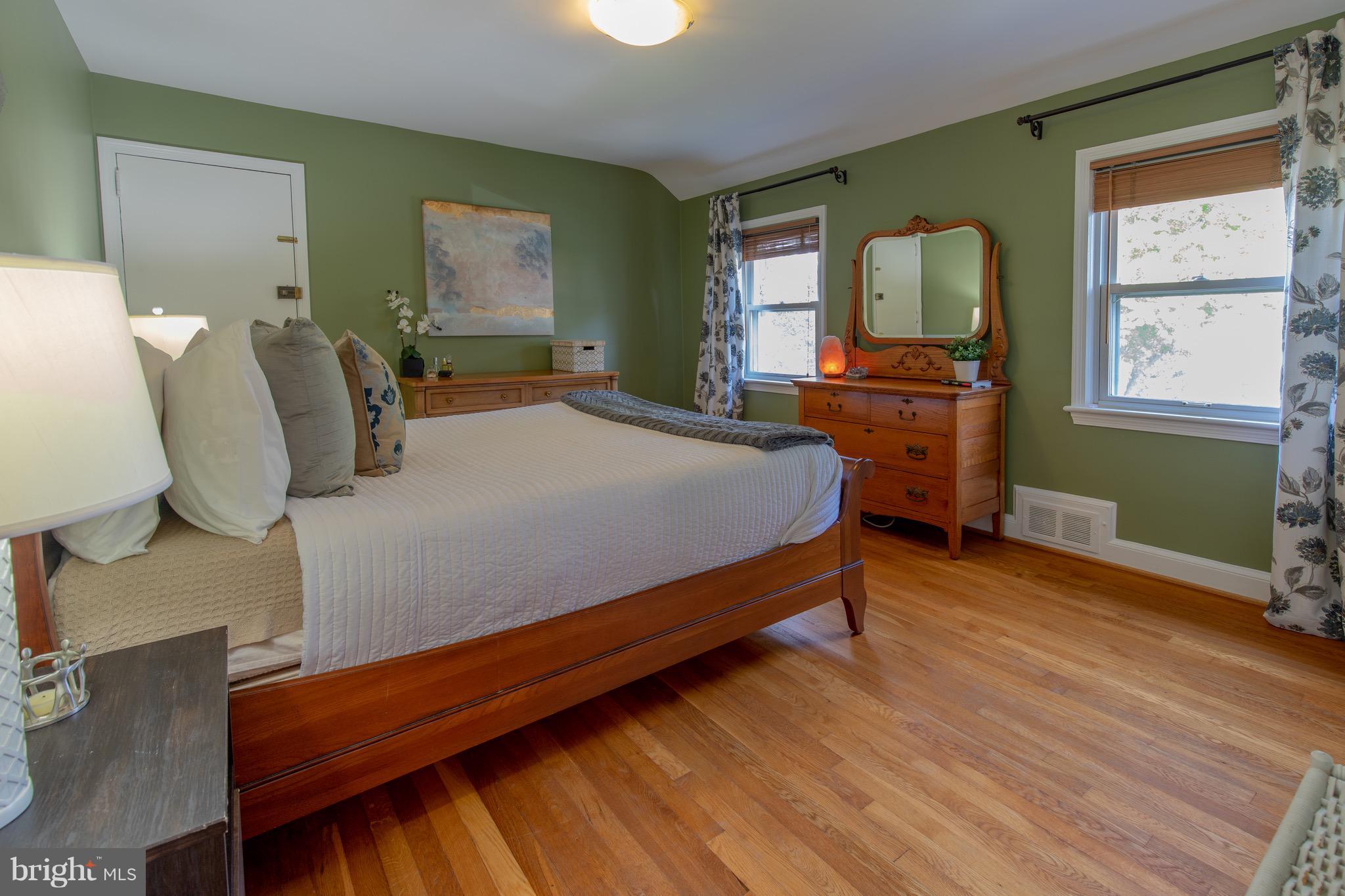 9522 Saybrook Avenue Silver Spring, MD 20901 - Photo 14 of 29 a bedroom with bed and window