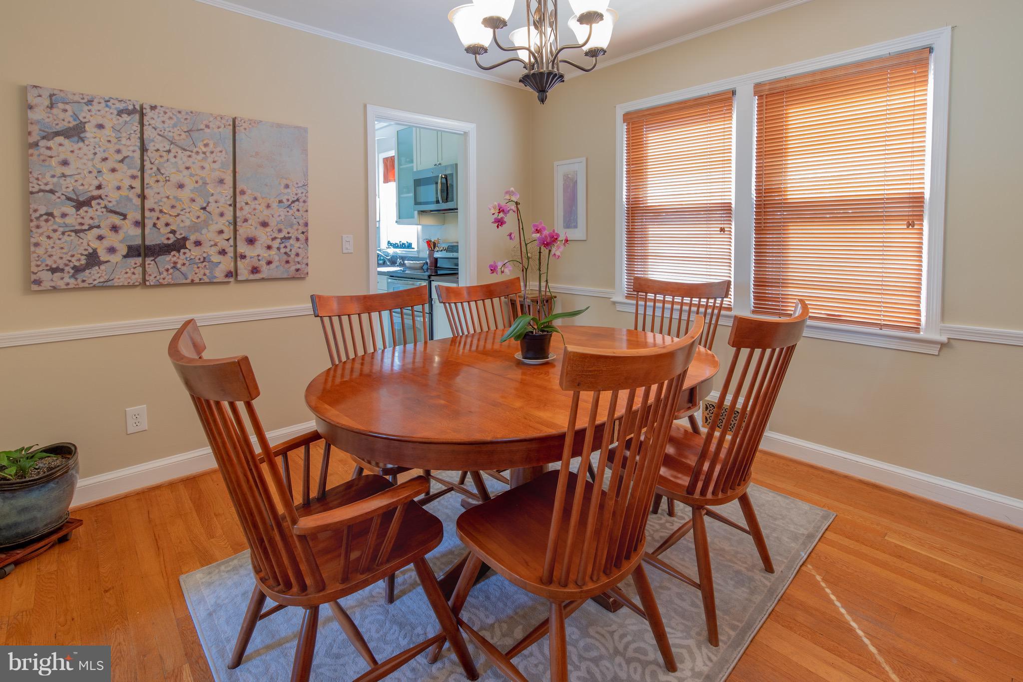 9522 Saybrook Avenue Silver Spring, MD 20901 - Photo 4 of 29 a view of a dining room with furniture window and outside view